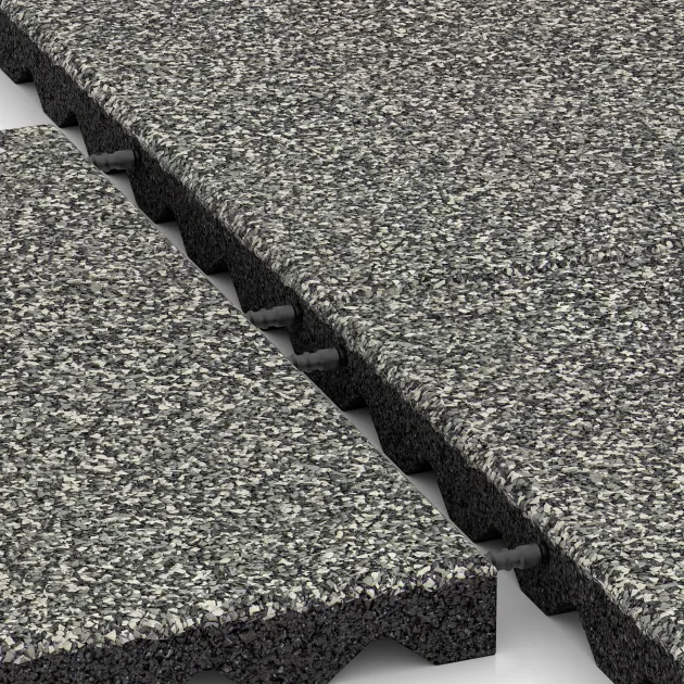 Großaufnahme vom Verbindungssystem von WARCO-Boden 5342 - Fallschutzplatte im Farbdesign Grauer Granit. Abmessungen 500 x 500 x 40 mm.