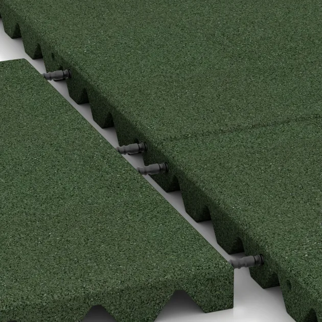 Großaufnahme vom Verbindungssystem von WARCO-Boden 5522 - Fallschutzplatte 4 cm - EN 1177 ≤ 125 cm im Farbdesign Grasgrün. Abmessungen 500 x 500 x 40 mm.