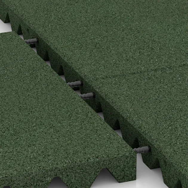 Großaufnahme vom Verbindungssystem von WARCO-Boden 0662 - Fallschutzplatte im Farbdesign Grasgrün. Abmessungen 500 x 500 x 45 mm.