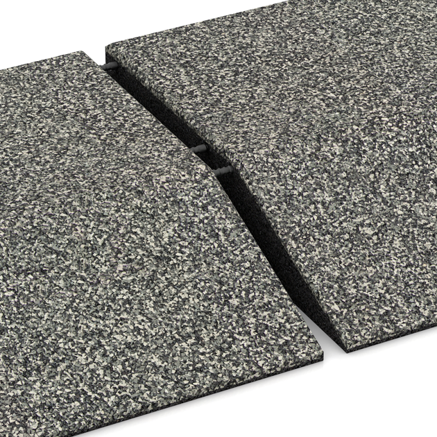 Großaufnahme vom Verbindungssystem von WARCO-Boden 3831 - Eck-Platte (zwei Seiten abgeschrägt) im Farbdesign Grauer Granit. Abmessungen 500 x 500 x 100 mm.