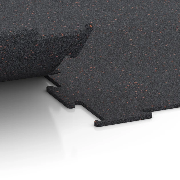 Großaufnahme vom Verbindungssystem von WARCO-Boden 6450 - Fitnessboden Kompakt im Farbdesign Leicht Rot Gesprenkelt. Abmessungen 100 × 100 × 0,8 cm.