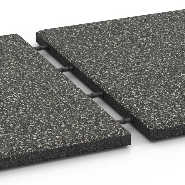 Großaufnahme vom Verbindungssystem von WARCO-Boden 6413 - Fallschutzplatte – 90 cm im Farbdesign Dunkelgrauer Granit. Abmessungen 50 x 50 x 3 cm.