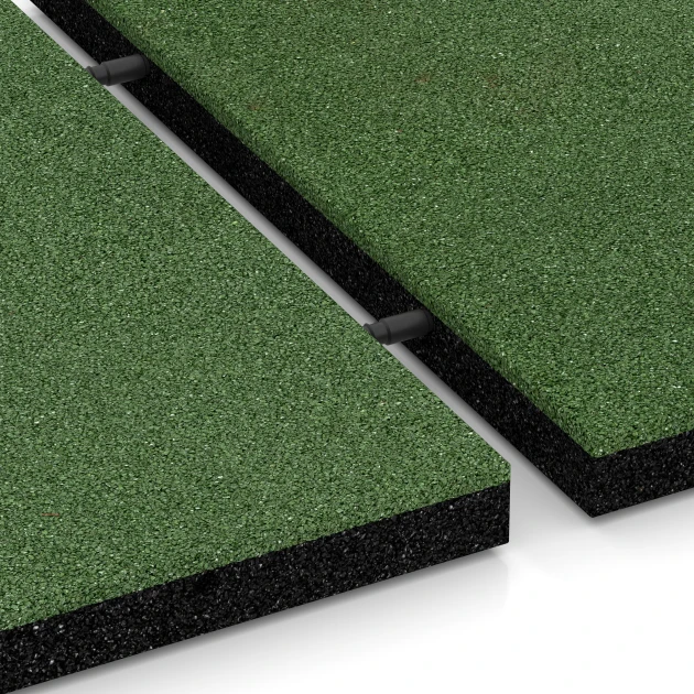 Großaufnahme vom Verbindungssystem von WARCO-Boden 6195 - Fallschutzplatten im Farbdesign Grasgrün. Abmessungen 50 x 50 x 4 cm.