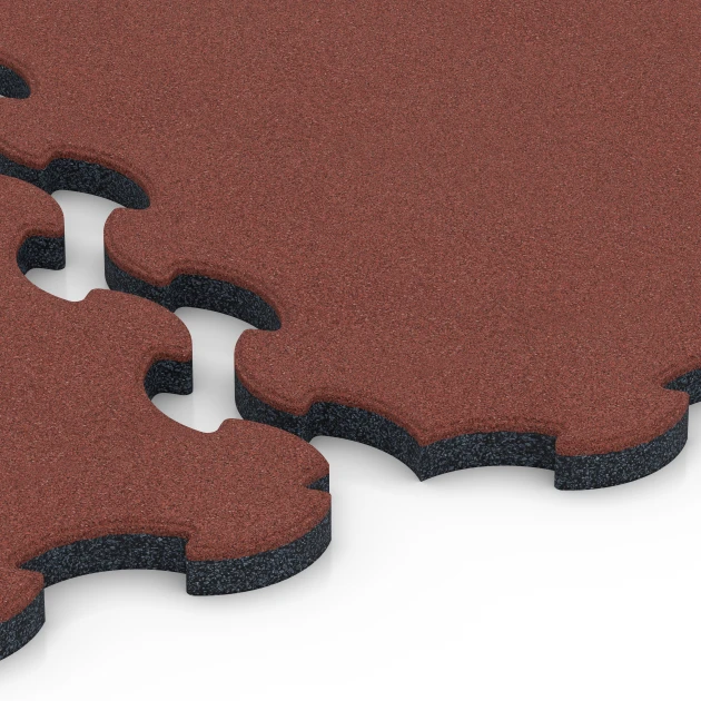 Großaufnahme vom Verbindungssystem von WARCO-Boden 6392 - Stallmatte Puzzle im Farbdesign Ziegelrot. Abmessungen 102,5 x 102,5 x 3 cm | 1,05 m².